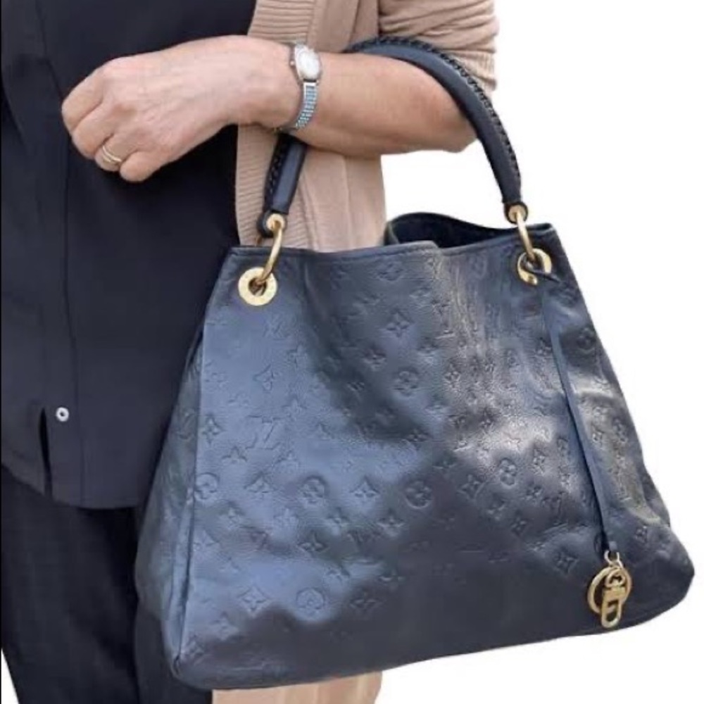 ✅  RARE ARTSY INFINI LOUIS VUITTON BAG